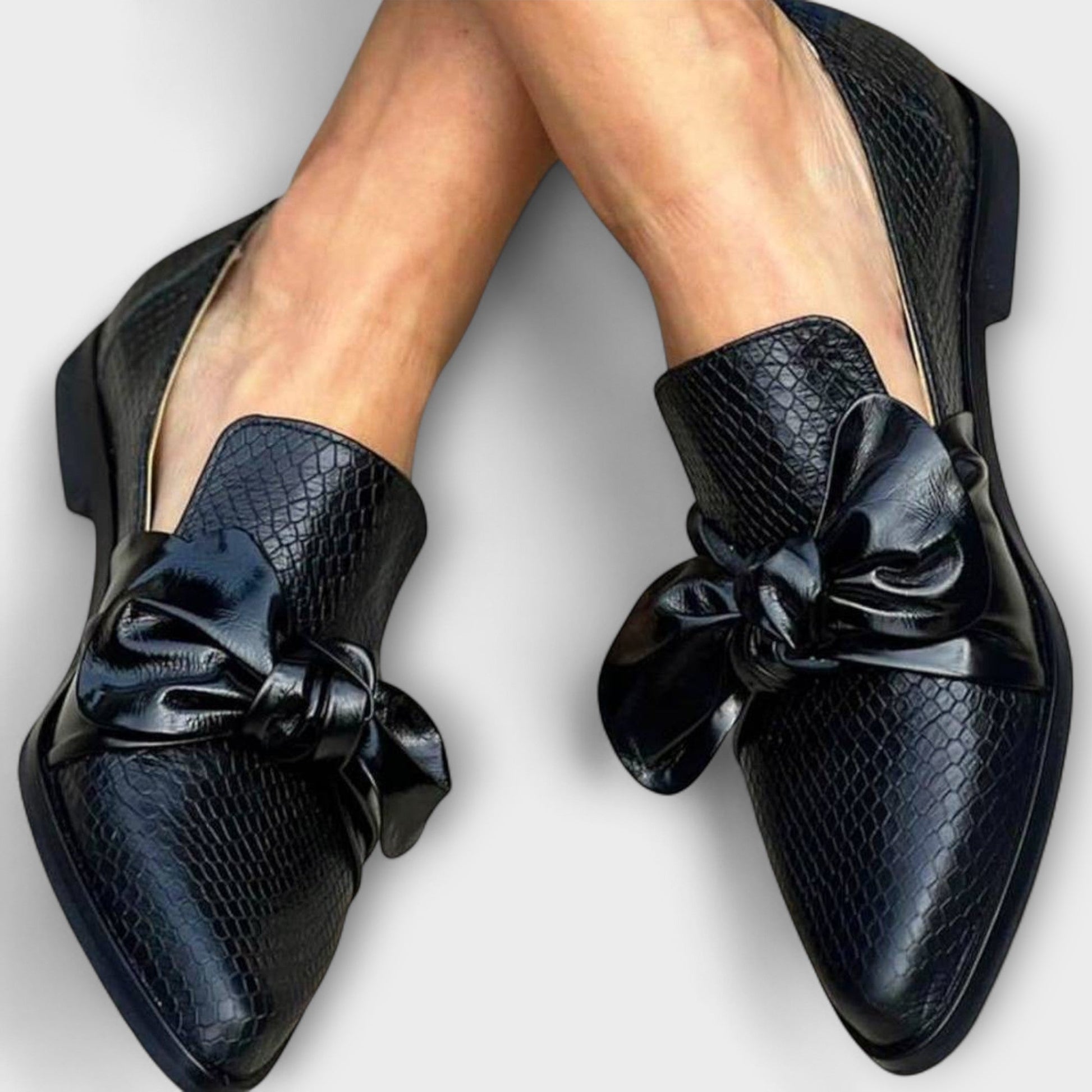 Clara Women’s Pointed Loafers featuring a stylish oversized bow detail, perfect for adding a chic touch to any outfit. 0