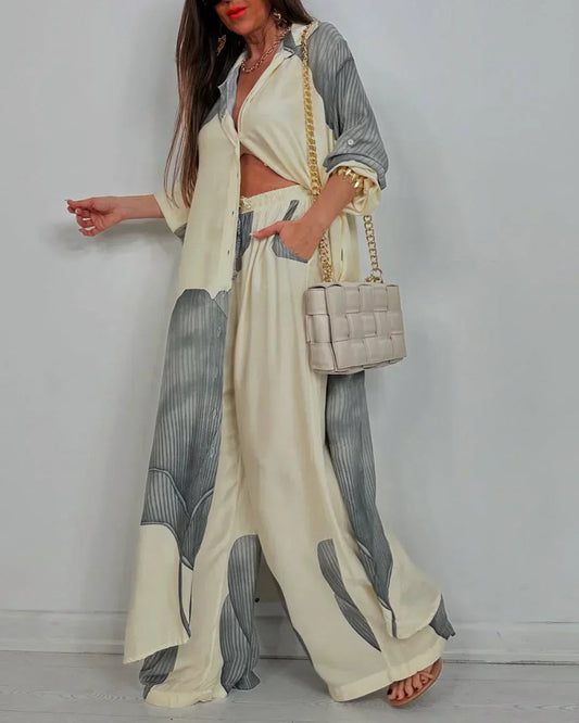 Cora Women’s Outfit Set featuring a stylish collared button shirt and elegant wide leg pants, perfect for casual or formal occasions. 0