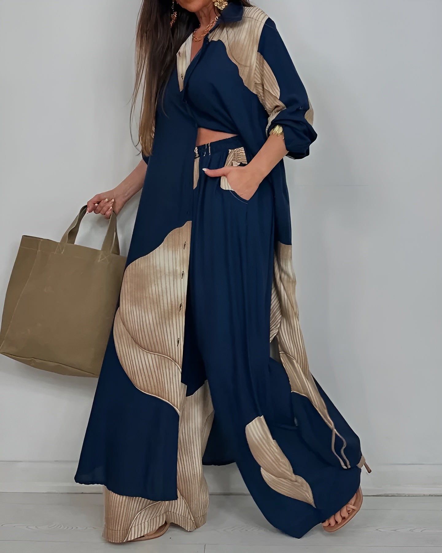 Cora Women’s Outfit Set featuring a stylish collared button shirt and elegant wide leg pants, perfect for casual or formal occasions. 5