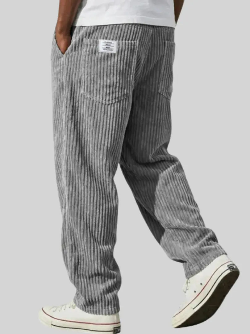 Dapper casual pants for men featuring an elastic waistband and functional pockets, perfect for comfortable and stylish everyday wear. 0