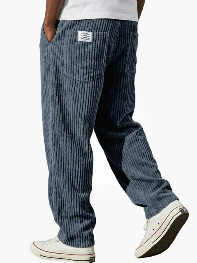 Dapper casual pants for men featuring an elastic waistband and functional pockets, perfect for comfortable and stylish everyday wear. 1