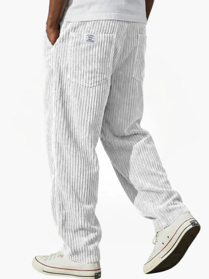 Dapper casual pants for men featuring an elastic waistband and functional pockets, perfect for comfortable and stylish everyday wear. 6