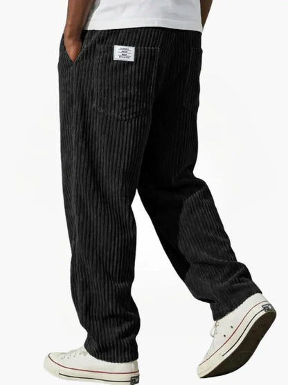 Dapper casual pants for men featuring an elastic waistband and functional pockets, perfect for comfortable and stylish everyday wear. 7