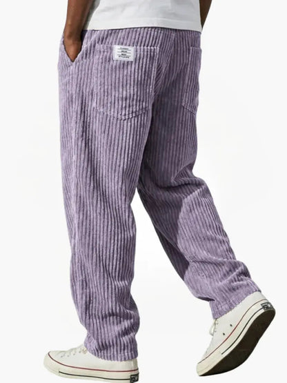 Dapper casual pants for men featuring an elastic waistband and functional pockets, perfect for comfortable and stylish everyday wear. 9