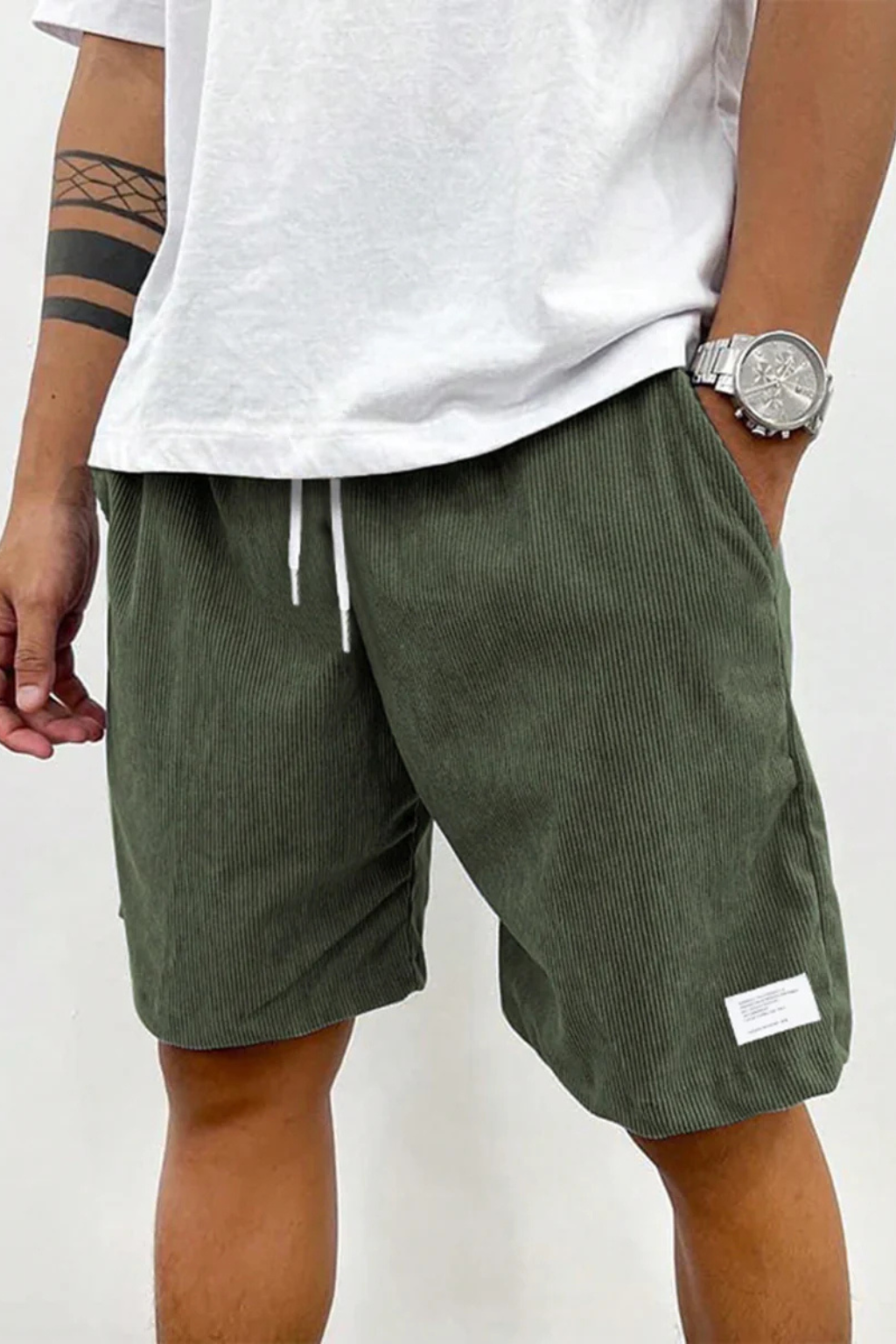 Dapper men's chino shorts featuring a high waist and stylish striped design, perfect for casual summer outings. 1