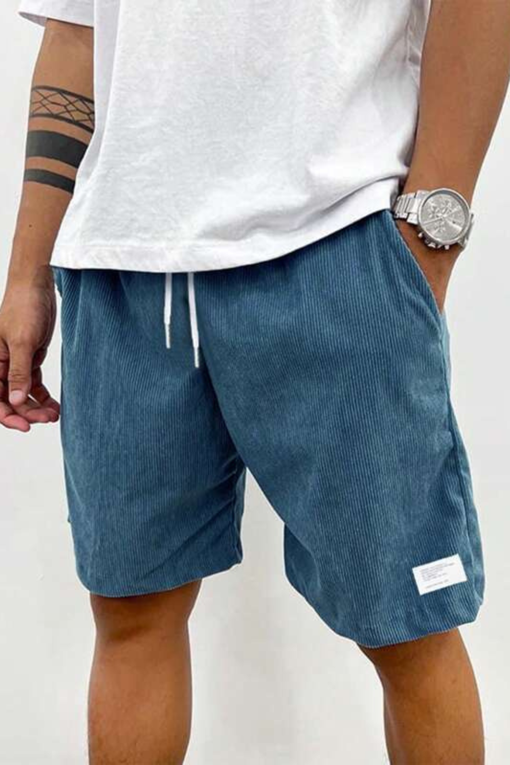 Dapper men's chino shorts featuring a high waist and stylish striped design, perfect for casual summer outings. 7