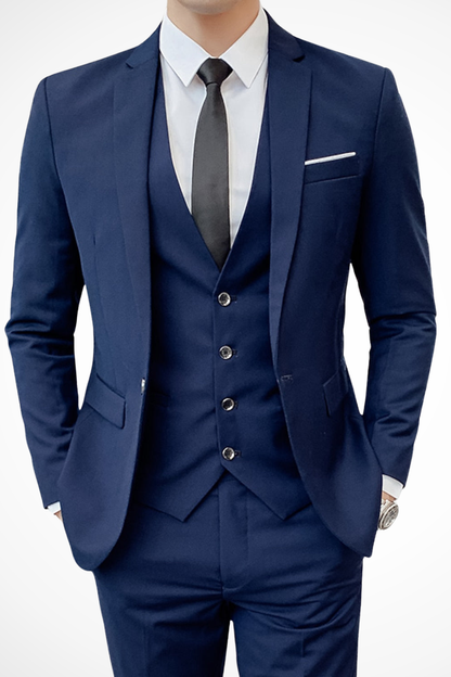 Dapper men’s suit featuring a notch lapel and a stylish three-piece design, perfect for formal occasions and professional settings. 2