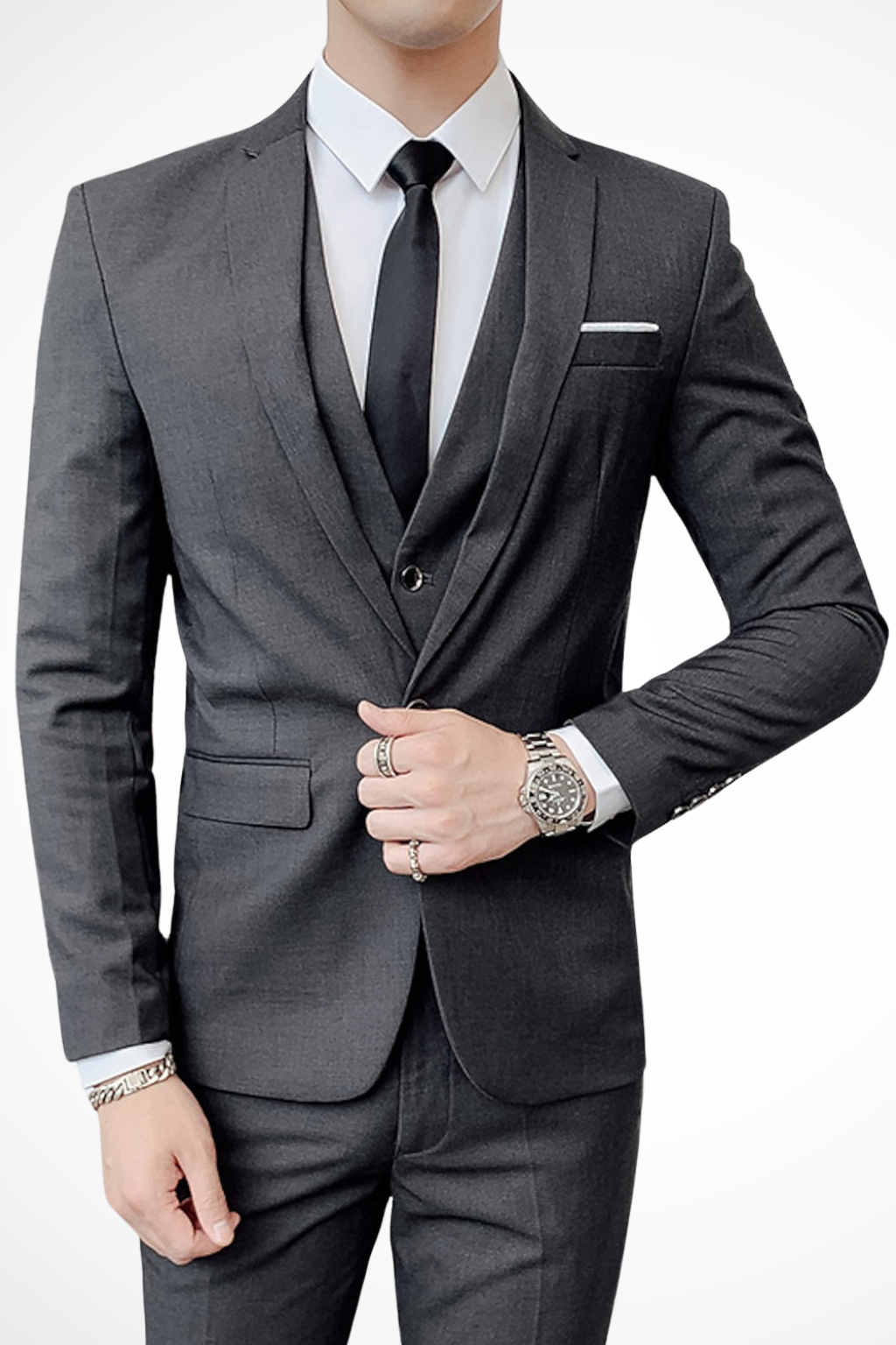 Dapper men’s suit featuring a notch lapel and a stylish three-piece design, perfect for formal occasions and professional settings. 5