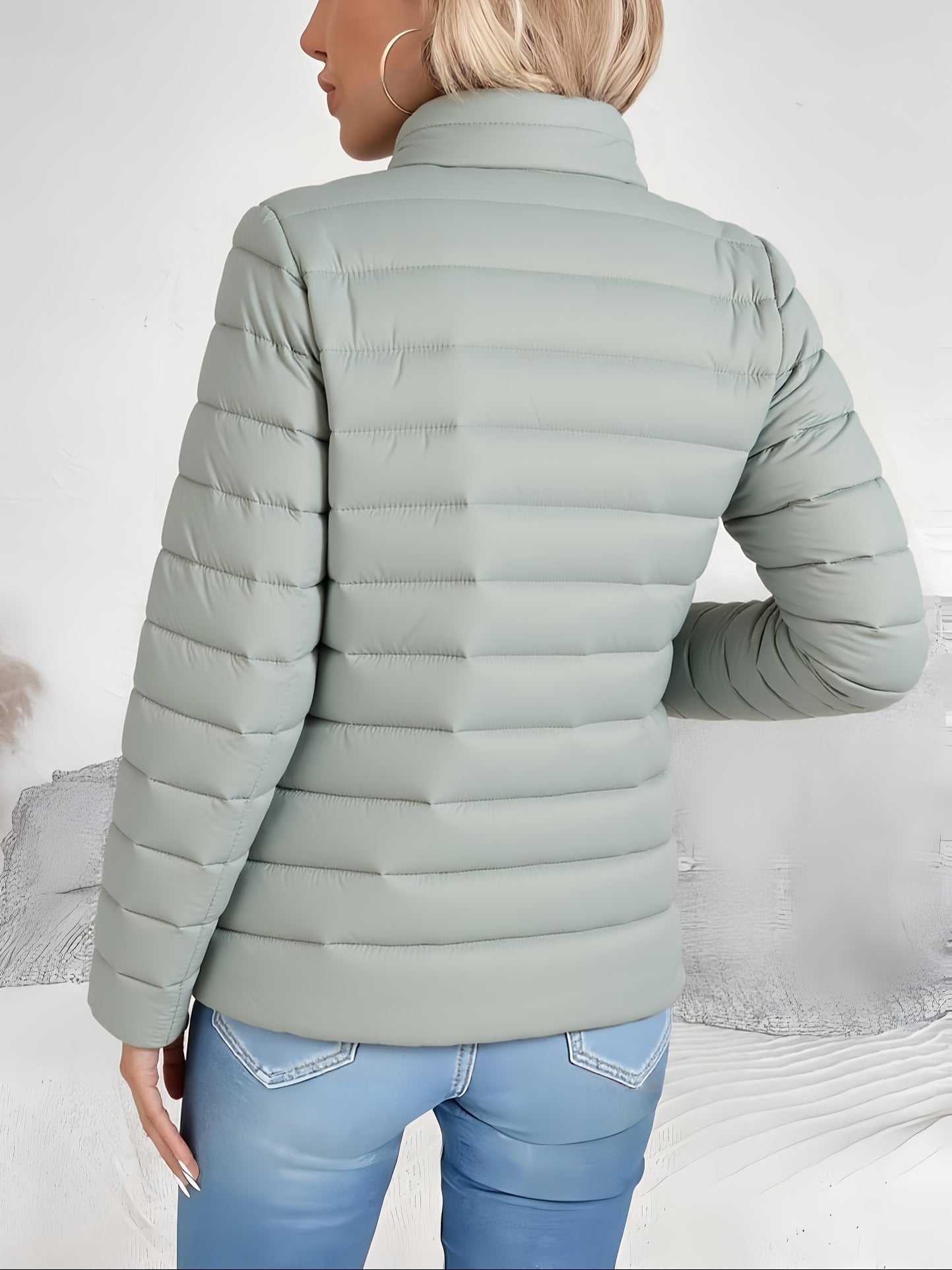 Dara Women's Lightweight Padded Jacket in a slim fit design, ideal for versatile layering, featuring a stylish and functional look for all seasons. 1
