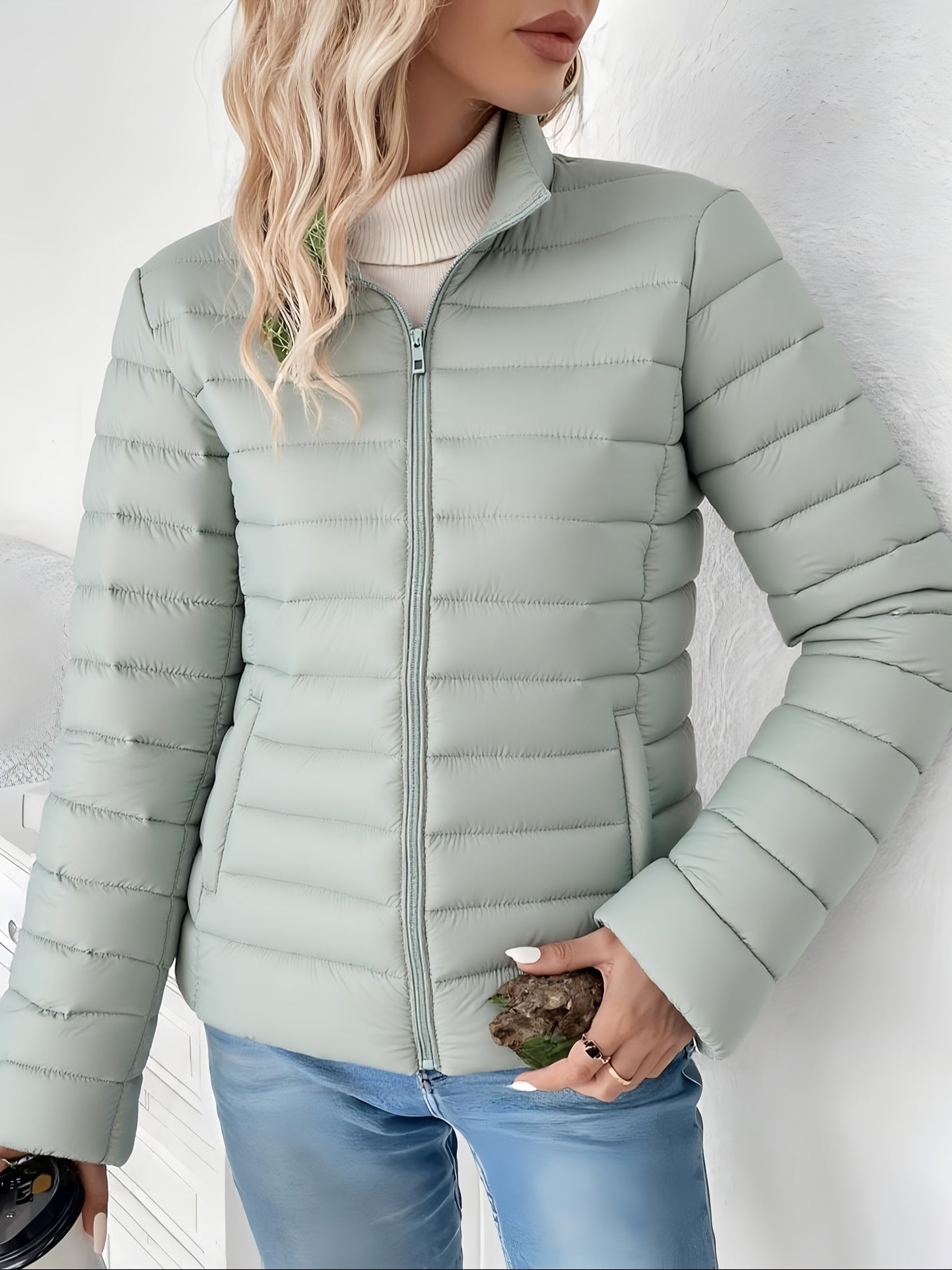 Dara Women's Lightweight Padded Jacket in a slim fit design, ideal for versatile layering, featuring a stylish and functional look for all seasons. 2