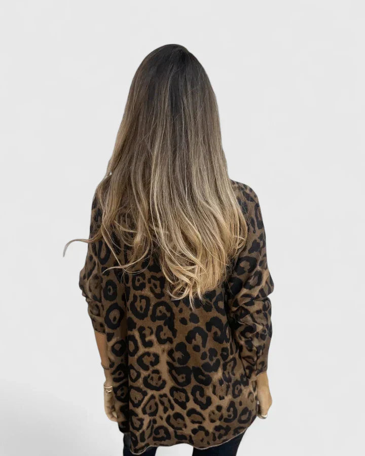Eda Women’s Top featuring a stylish leopard print design and a comfortable relaxed fit, perfect for casual wear. 2