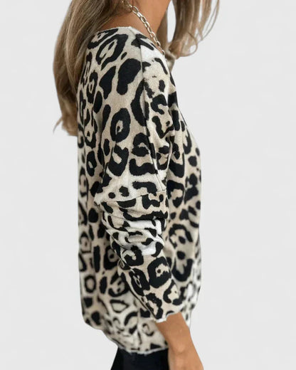 Eda Women’s Top featuring a stylish leopard print design and a comfortable relaxed fit, perfect for casual wear. 4