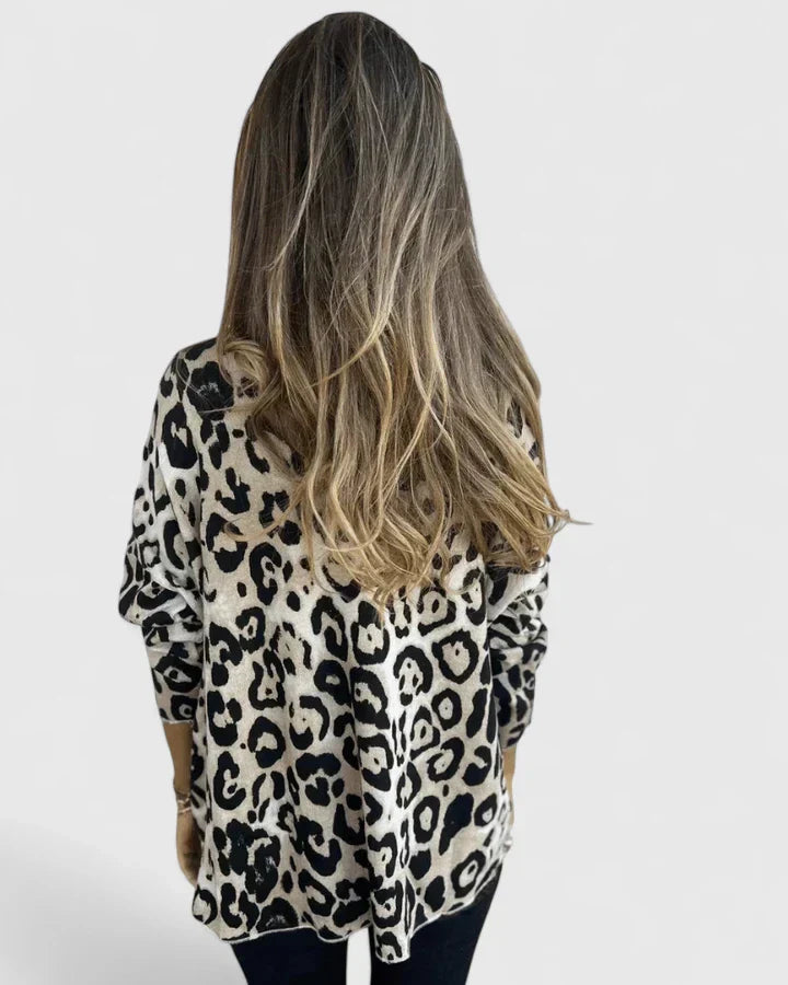 Eda Women’s Top featuring a stylish leopard print design and a comfortable relaxed fit, perfect for casual wear. 5
