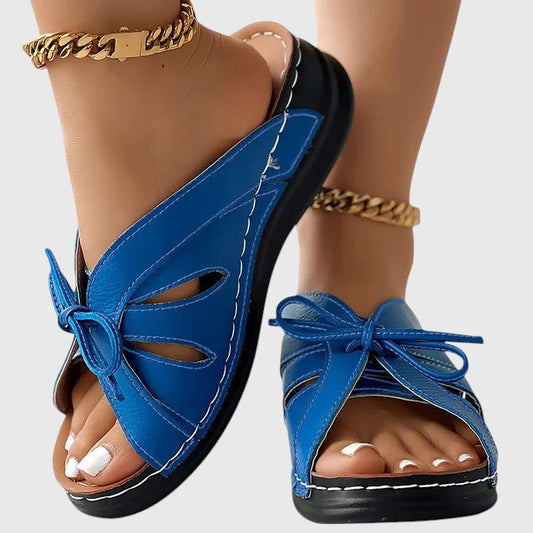 Elsina Women’s Sandals featuring soft arch support and a convenient slip-on design, perfect for all-day comfort and stylish summer wear. 0