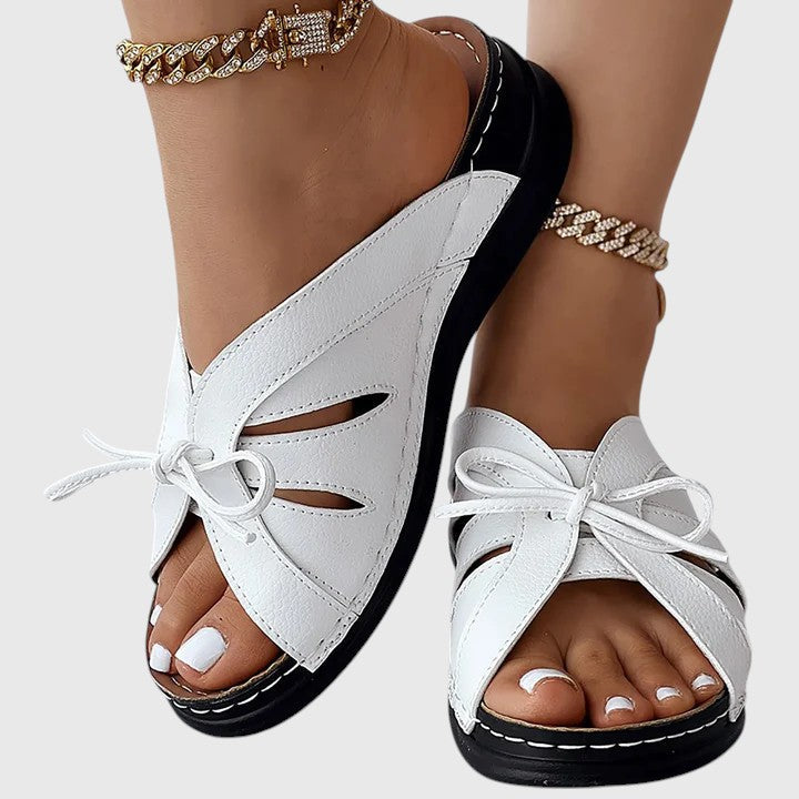 Elsina Women’s Sandals featuring soft arch support and a convenient slip-on design, perfect for all-day comfort and stylish summer wear. 3
