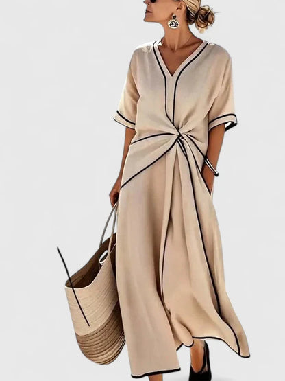 Elysia Women’s Dress featuring a stylish vertical stripe pattern and a lightweight design, perfect for casual outings and summer events. 1