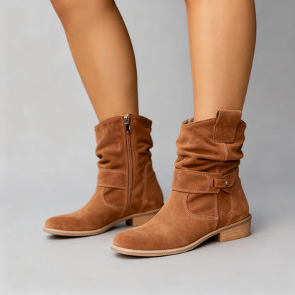 Elysia Women's Mid-Calf Slouch Boots in black, featuring a stylish slouch design and soft supportive comfort for all-day wear. 1