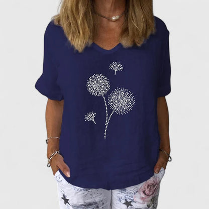 Elysia Women’s Summer Blouse featuring a loose fit design and vibrant casual print, perfect for warm weather outings. 3