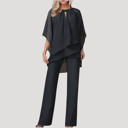 Elysia Women’s Trouser Suit featuring a stylish flowing chiffon overlay, perfect for formal occasions and elegant events. 1