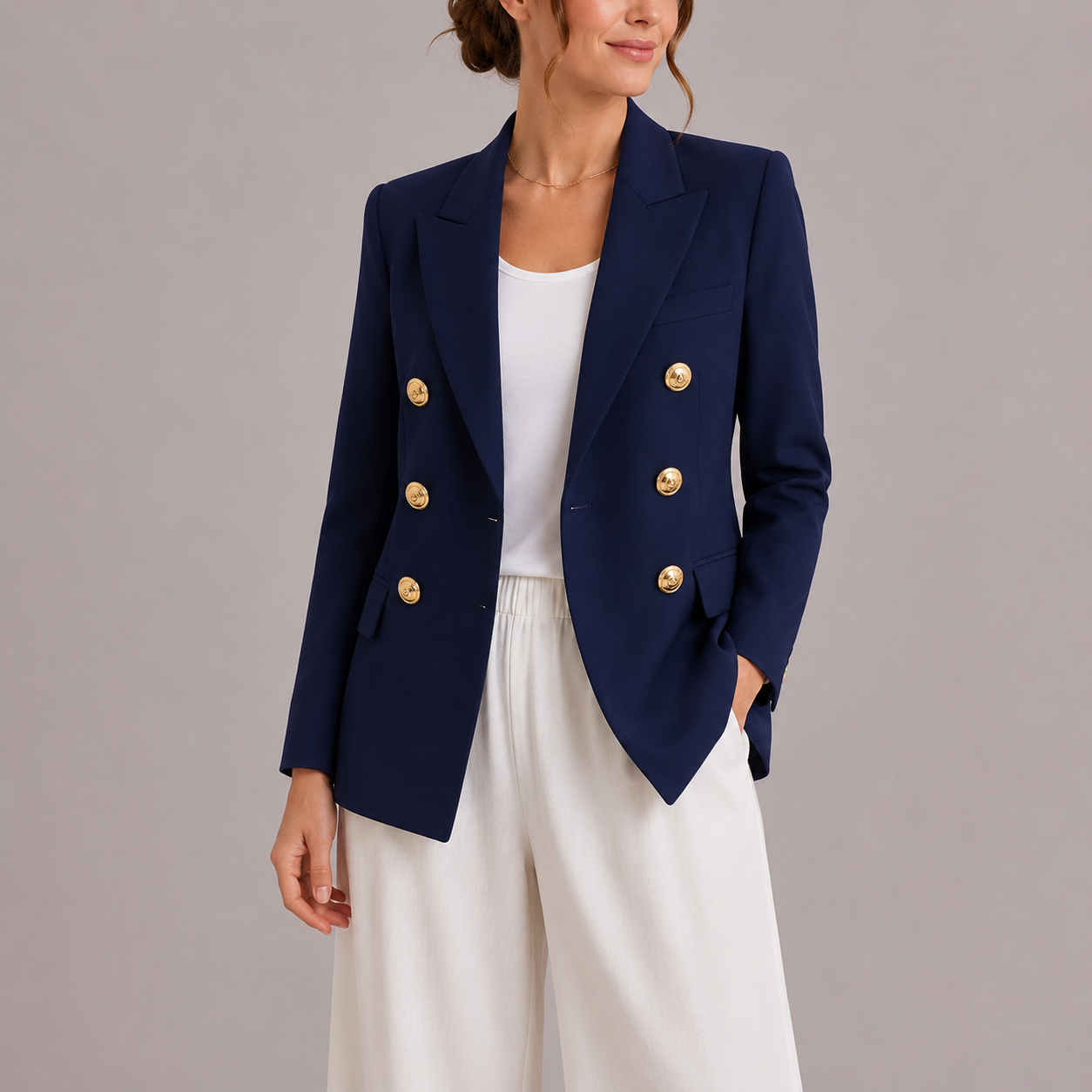 Elysian Women's Blazer featuring a stylish double-breasted design and elegant gold button accents, perfect for sophisticated office wear or chic casual outings. 1