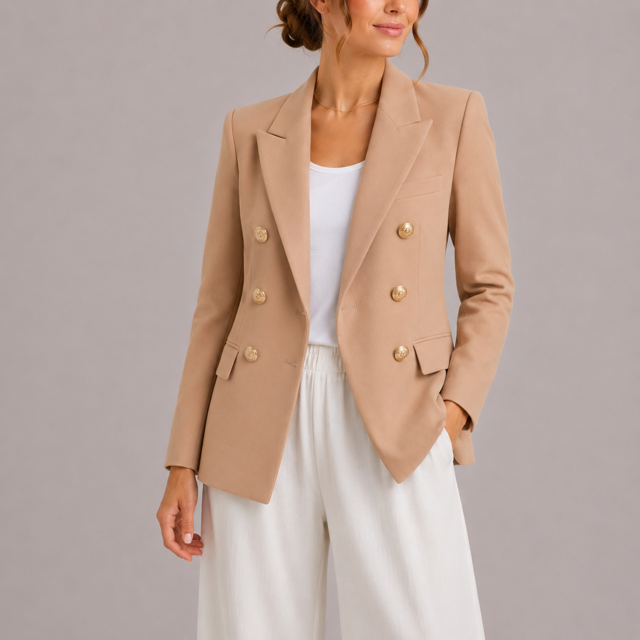 Elysian Women's Blazer featuring a stylish double-breasted design and elegant gold button accents, perfect for sophisticated office wear or chic casual outings. 2