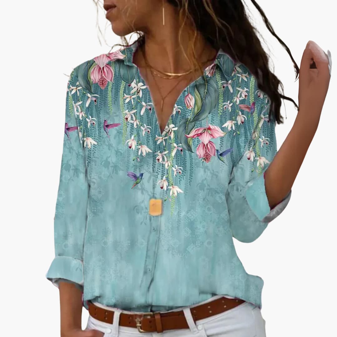 Flora Women’s Blouse featuring a vibrant colorblock floral design and a flattering cut, perfect for stylish casual wear. 4