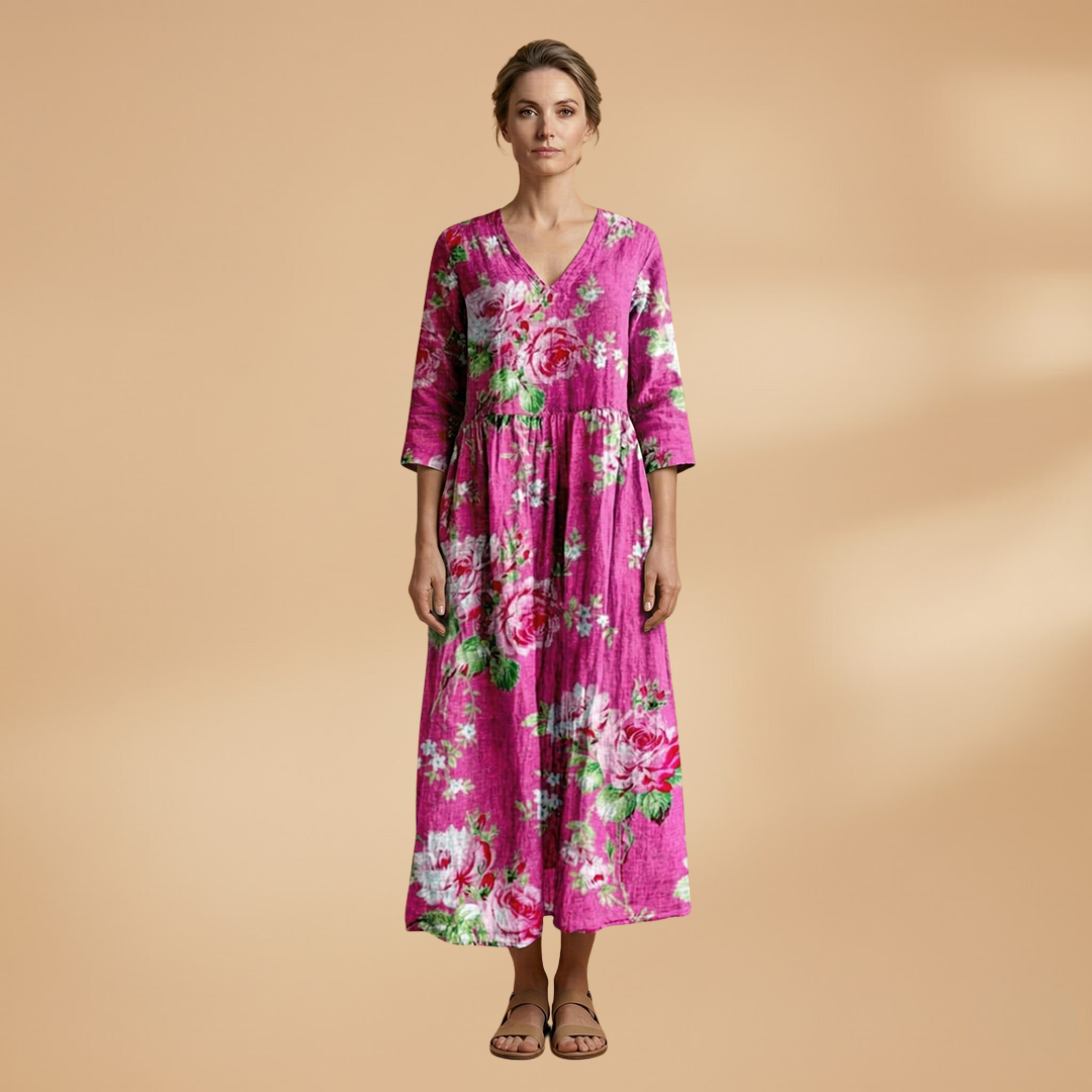 Flora Women’s Dress featuring a V-neck design and a flowing skirt adorned with a vibrant floral pattern, perfect for summer outings and special occasions. 10