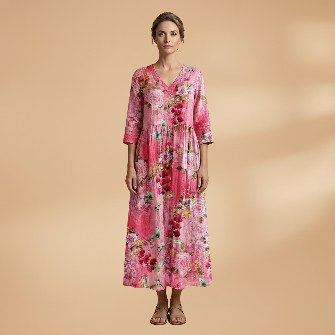 Flora Women’s Dress featuring a V-neck design and a flowing skirt adorned with a vibrant floral pattern, perfect for summer outings and special occasions. 7