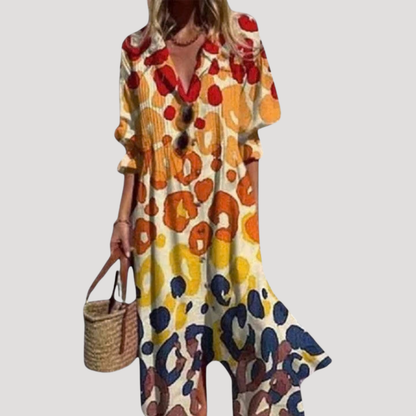 Flora Women’s Maxi Dress featuring a stylish button front and vibrant floral print, perfect for summer outings and casual events. 1