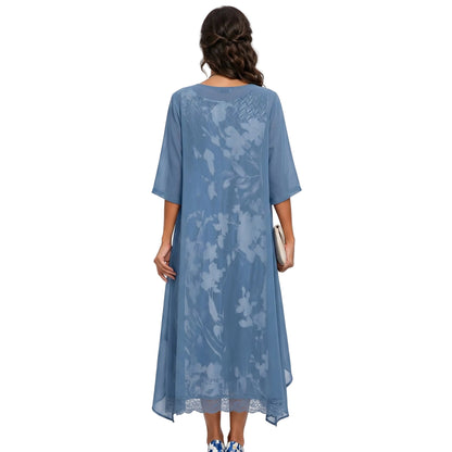 Flora Women’s Maxi Dress featuring a vibrant floral pattern paired with a stylish layered cardigan, perfect for spring and summer outings. 1
