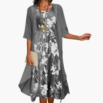 Flora Women’s Maxi Dress featuring a vibrant floral pattern paired with a stylish layered cardigan, perfect for spring and summer outings. 4