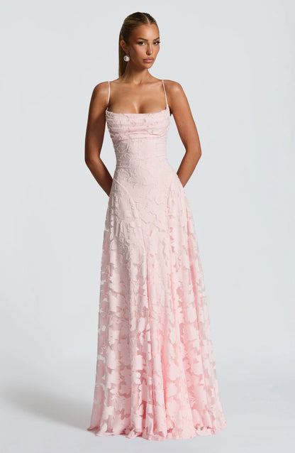 Flora Women’s Maxi Dress featuring thin straps and a vibrant floral pattern, perfect for summer outings and special occasions. 1