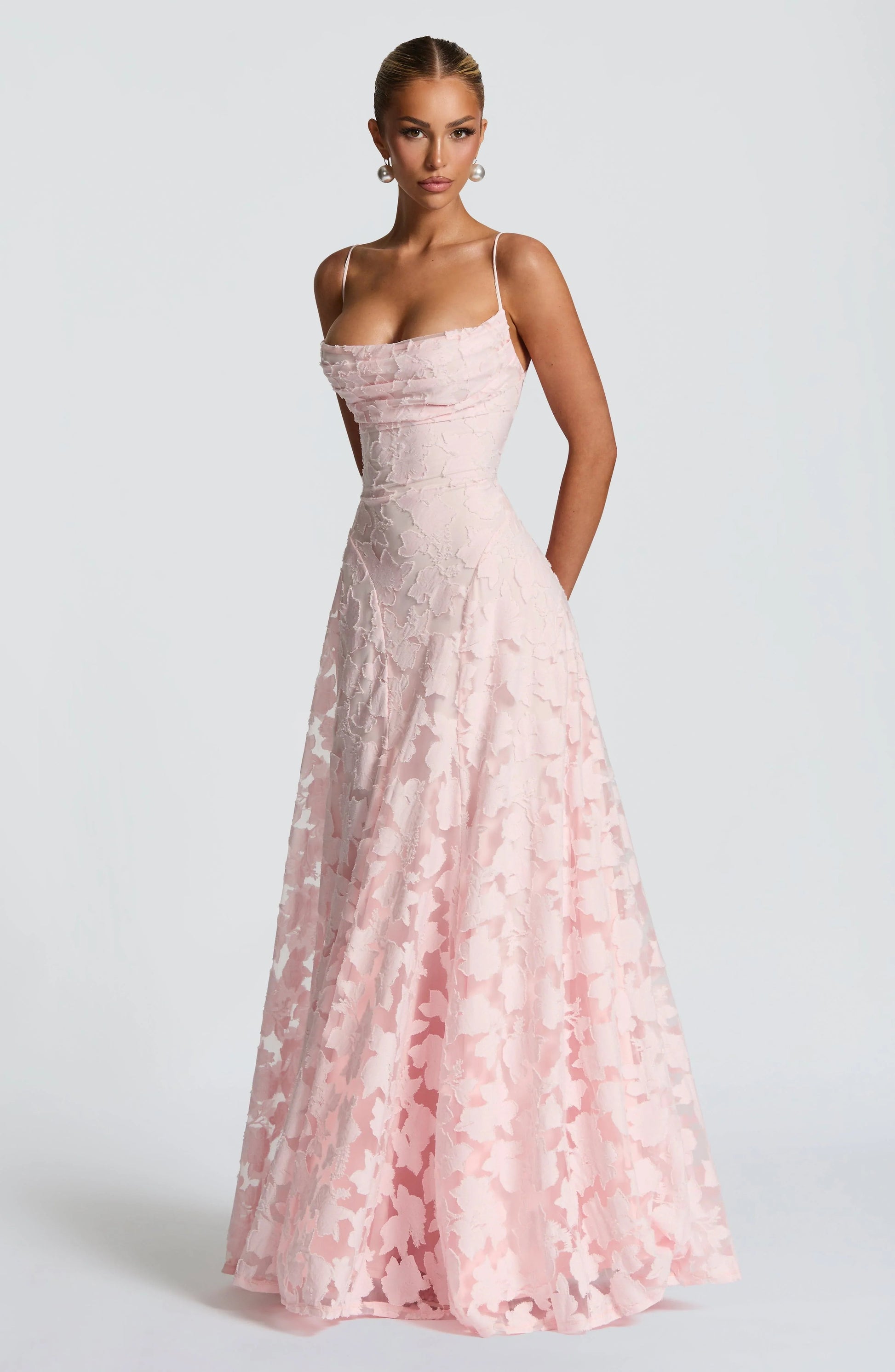 Flora Women’s Maxi Dress featuring thin straps and a vibrant floral pattern, perfect for summer outings and special occasions. 2