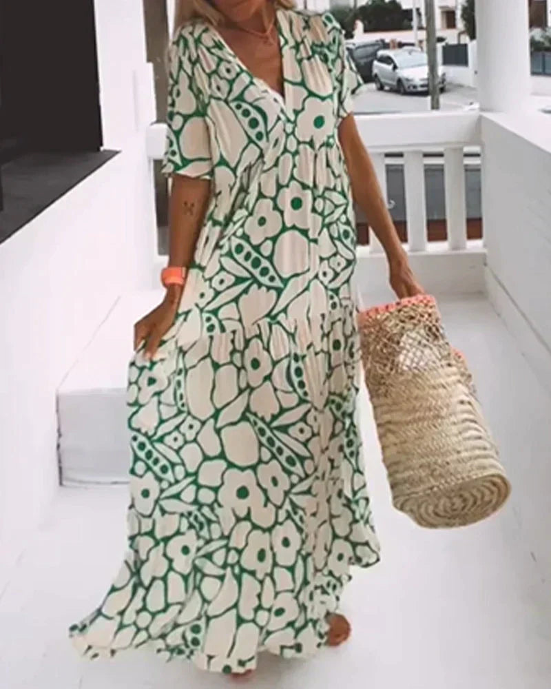 Flora Women’s Maxi Dress featuring a stylish V-Neck and elegant flutter sleeves, designed in a vibrant abstract print perfect for summer outings. 7