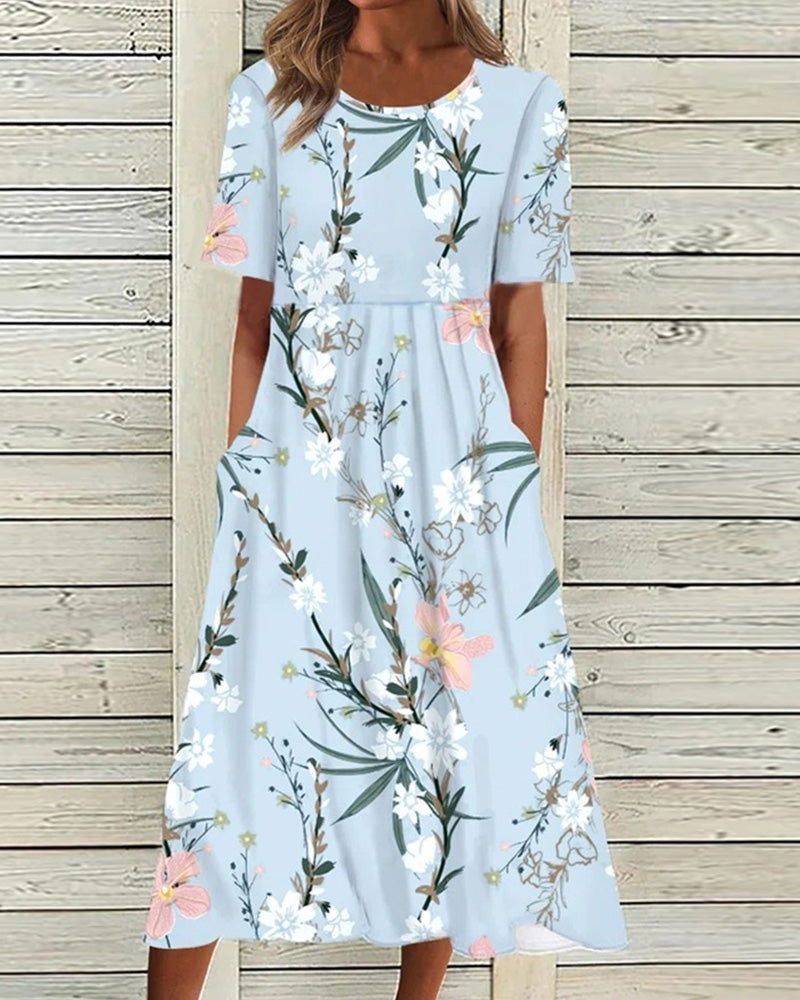 Flora Women’s Midi Dress featuring a vibrant floral print, elegantly designed with functional side pockets for practicality and style. 0