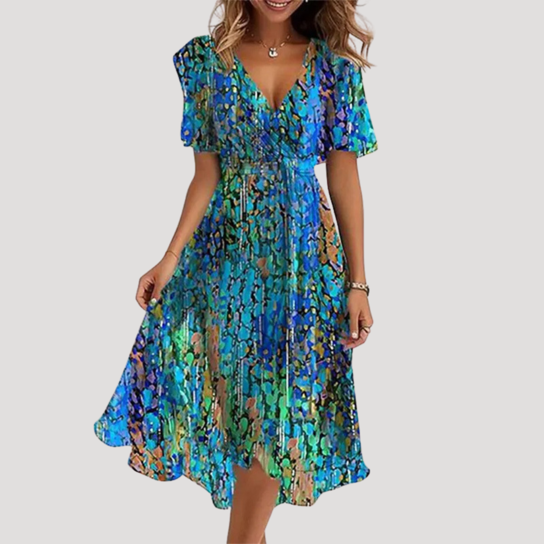 Flora Women’s Midi Dress featuring a stylish floral wrap design and a defined waist, perfect for summer outings and special occasions. 1