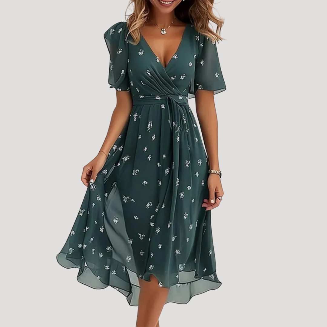 Flora Women’s Midi Dress featuring a stylish floral wrap design and a defined waist, perfect for summer outings and special occasions. 2