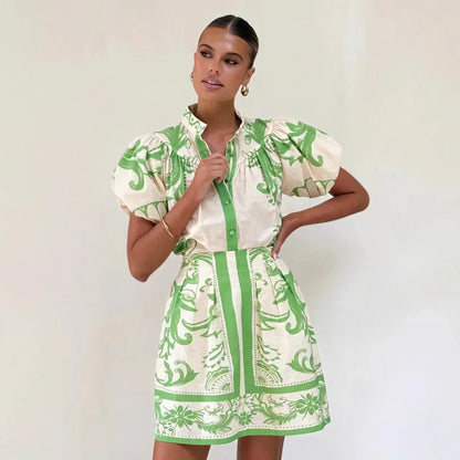 Flora Women's Mini Dress featuring stylish puff sleeves and an elegant baroque floral print, perfect for spring and summer outings. 1
