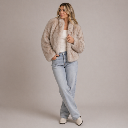 Furielle Women’s Faux Fur Coat featuring a stylish round neck and a soft fit, perfect for staying warm and fashionable in colder weather. 0