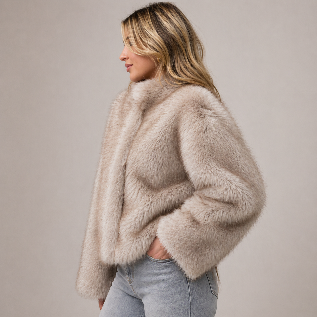 Furielle Women’s Faux Fur Coat featuring a stylish round neck and a soft fit, perfect for staying warm and fashionable in colder weather. 1