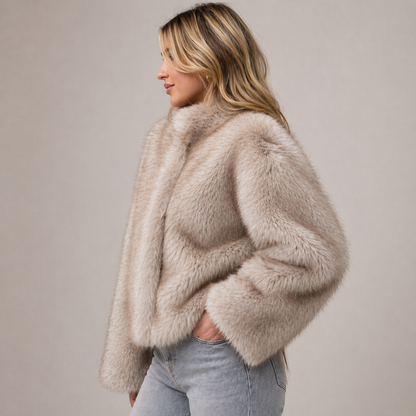 Furielle Women’s Faux Fur Coat featuring a stylish round neck and a soft fit, perfect for staying warm and fashionable in colder weather. 1