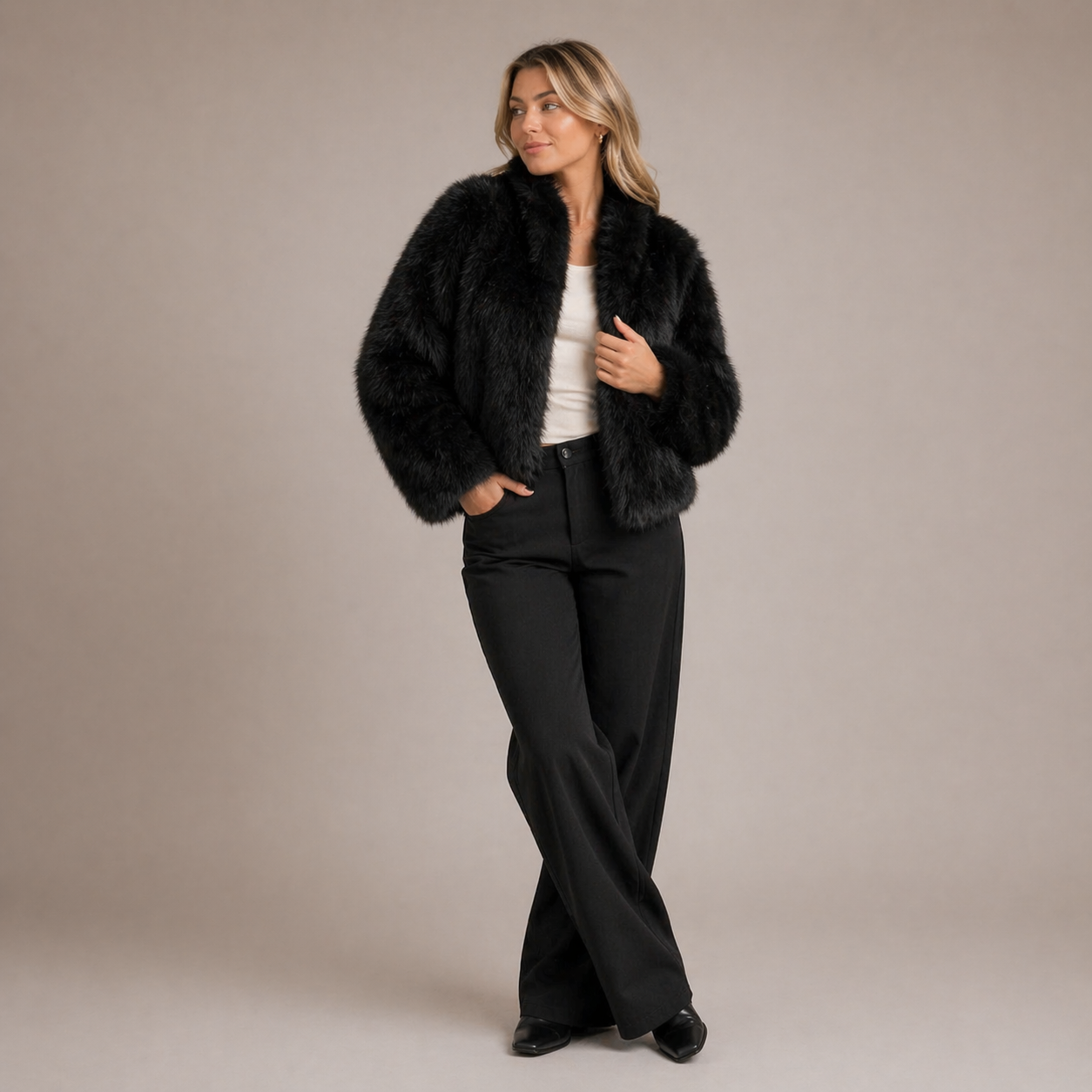 Furielle Women’s Faux Fur Coat featuring a stylish round neck and a soft fit, perfect for staying warm and fashionable in colder weather. 2