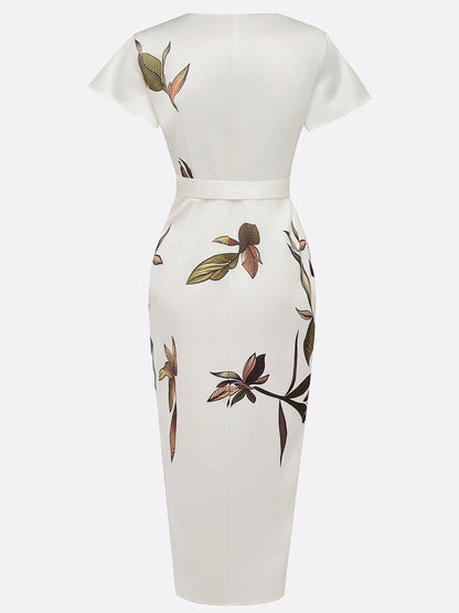 Gala Women’s Wrap Dress featuring an adjustable tie and a stylish leaf print design, perfect for versatile summer outings. 6