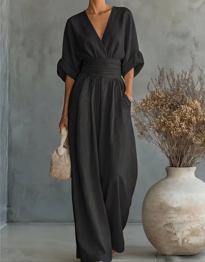 Gina Women’s Jumpsuit featuring a stylish wrap bodice and elegant wide-leg design, perfect for casual outings or special occasions. 10