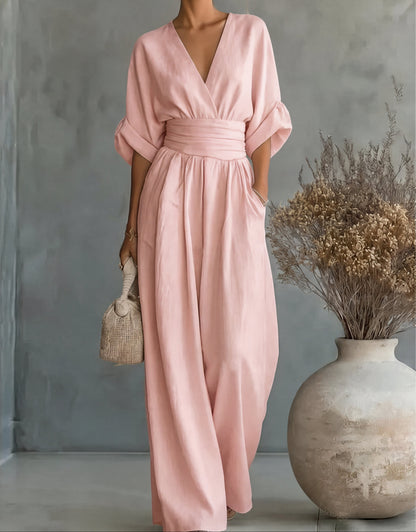 Gina Women’s Jumpsuit featuring a stylish wrap bodice and elegant wide-leg design, perfect for casual outings or special occasions. 12