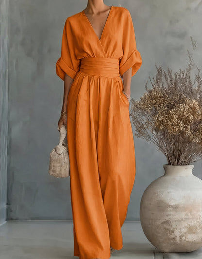 Gina Women’s Jumpsuit featuring a stylish wrap bodice and elegant wide-leg design, perfect for casual outings or special occasions. 14