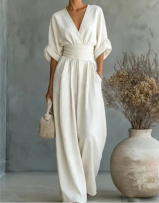 Gina Women’s Jumpsuit featuring a stylish wrap bodice and elegant wide-leg design, perfect for casual outings or special occasions. 3