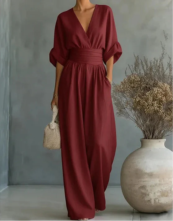 Gina Women’s Jumpsuit featuring a stylish wrap bodice and elegant wide-leg design, perfect for casual outings or special occasions. 7