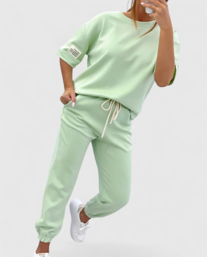 Glory Women’s Comfortable Set featuring a stylish half-moon sleeve top and adjustable ankle-length trousers, perfect for casual outings and relaxed days at home. 1