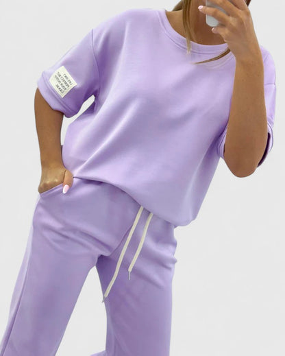 Glory Women’s Comfortable Set featuring a stylish half-moon sleeve top and adjustable ankle-length trousers, perfect for casual outings and relaxed days at home. 3
